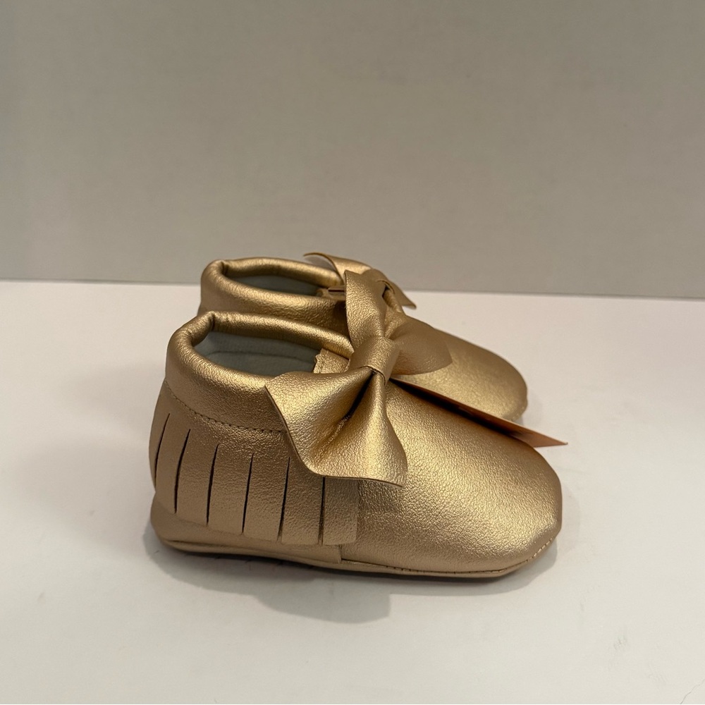 Gold baby moccasins size 4 12-18 months